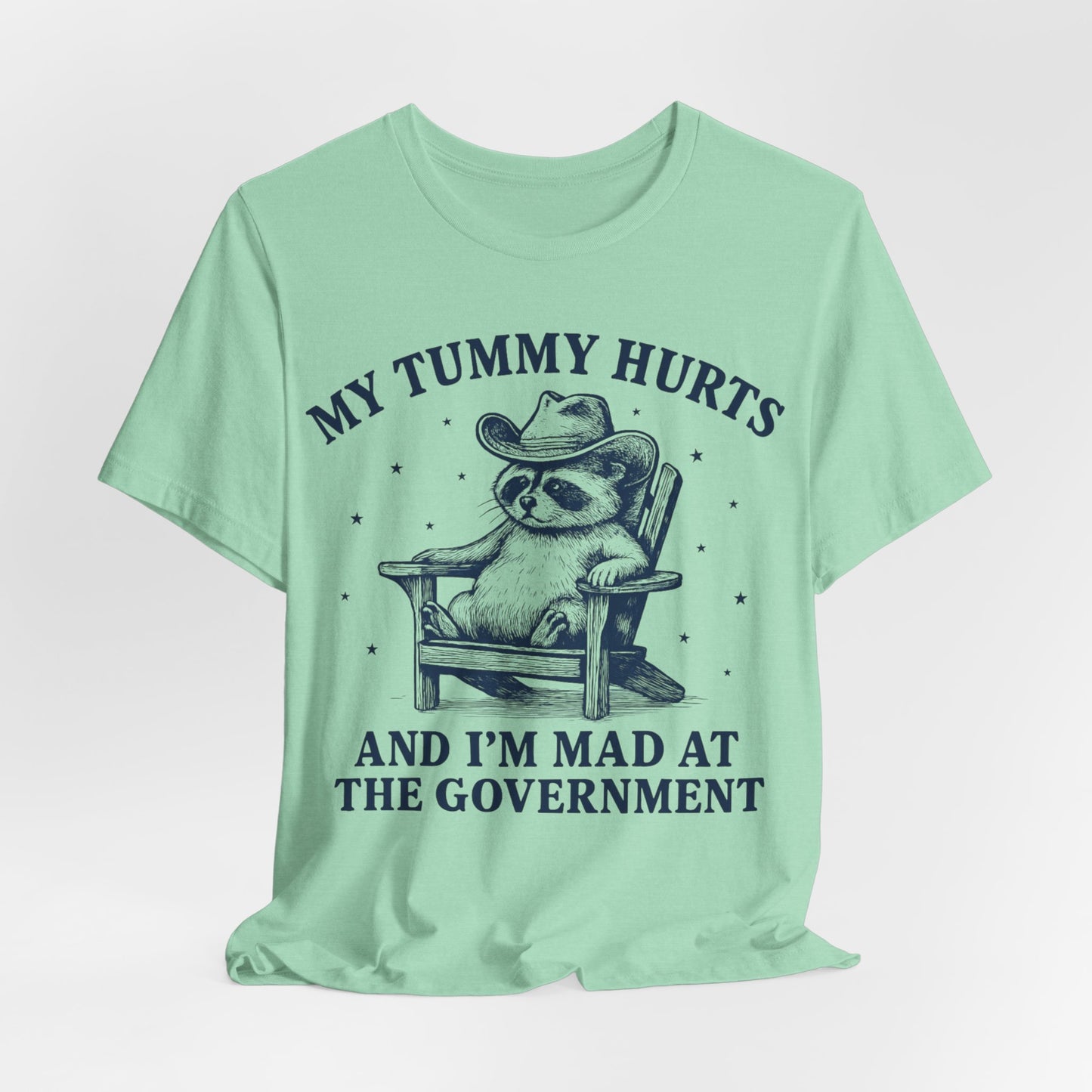 My Tummy Hurts and I’m Mad at the Government – Cowboy Raccoon Tee