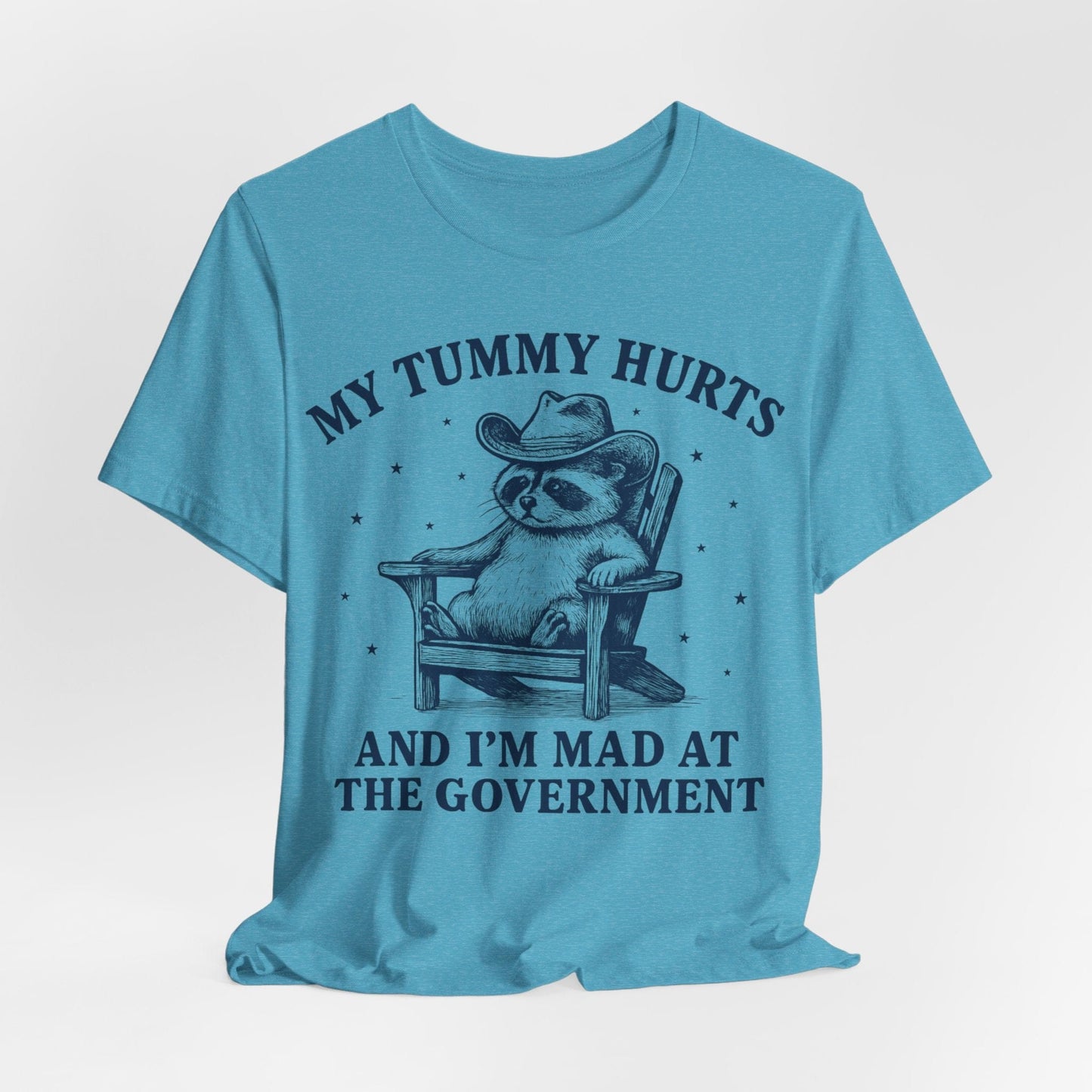 My Tummy Hurts and I’m Mad at the Government – Cowboy Raccoon Tee