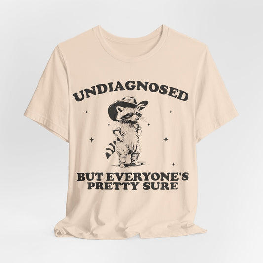 Undiagnosed but Everyone’s Pretty Sure – Cowboy Raccoon Tee