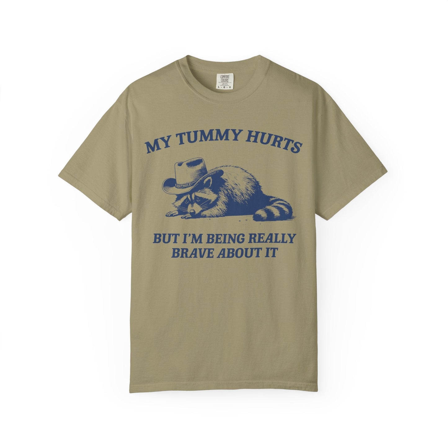My Tummy Hurts But I’m Being Really Brave About It – Cowboy Raccoon Tee