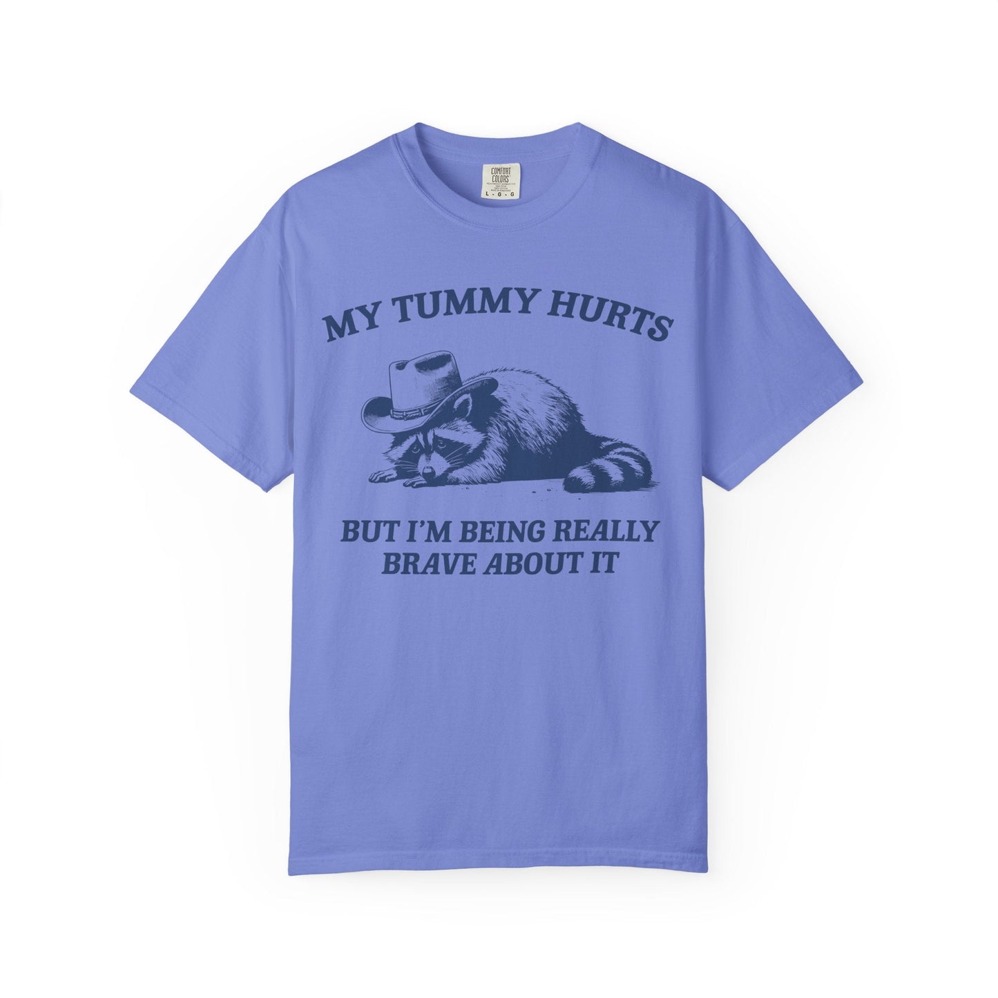 My Tummy Hurts But I’m Being Really Brave About It – Cowboy Raccoon Tee