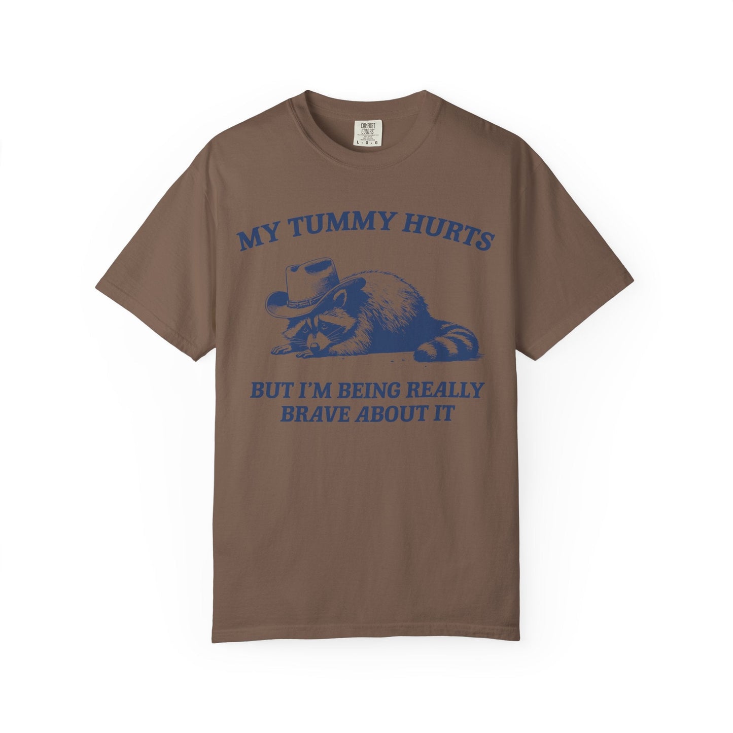 My Tummy Hurts But I’m Being Really Brave About It – Cowboy Raccoon Tee