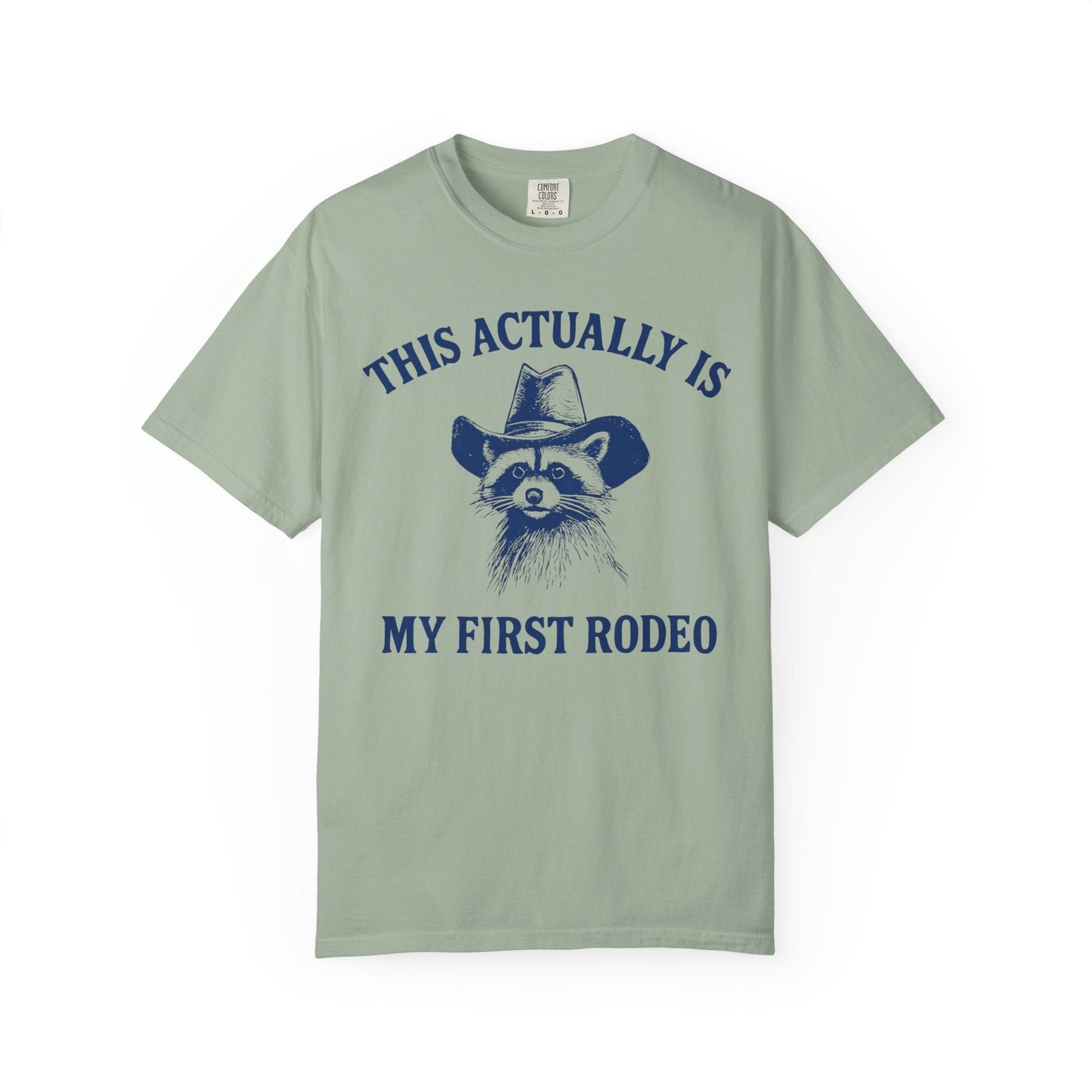 This Actually Is My First Rodeo – Cowboy Raccoon Tee