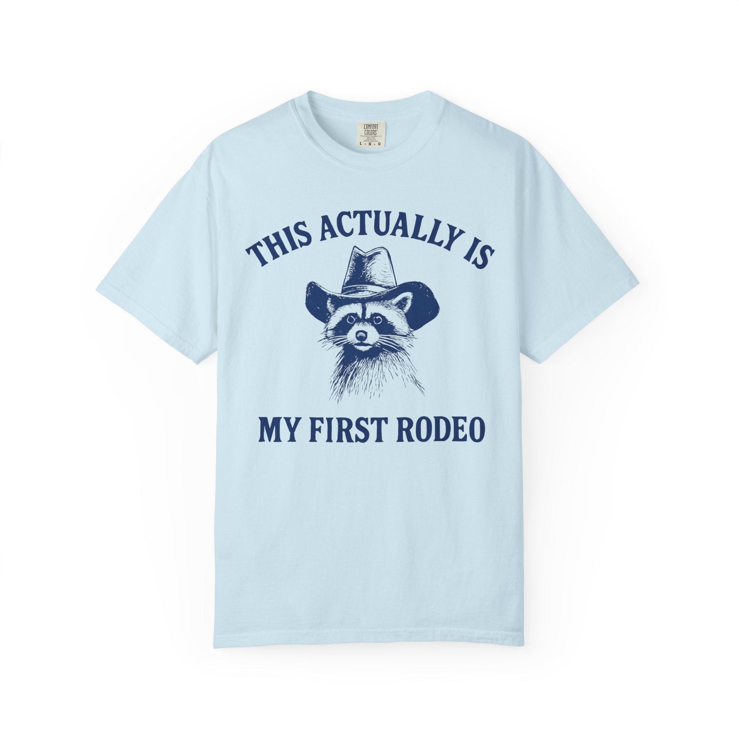 This Actually Is My First Rodeo – Cowboy Raccoon Tee