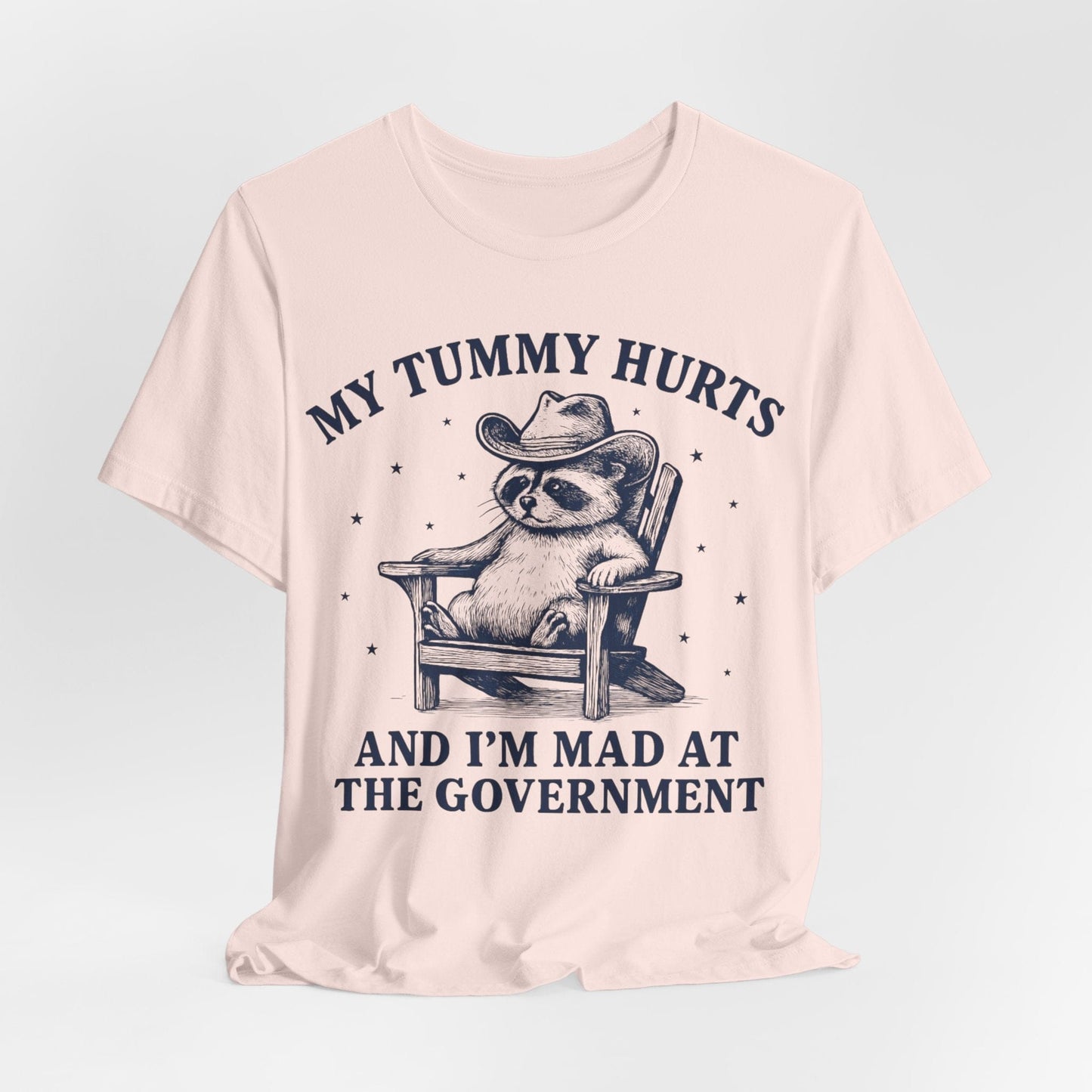 My Tummy Hurts and I’m Mad at the Government – Cowboy Raccoon Tee